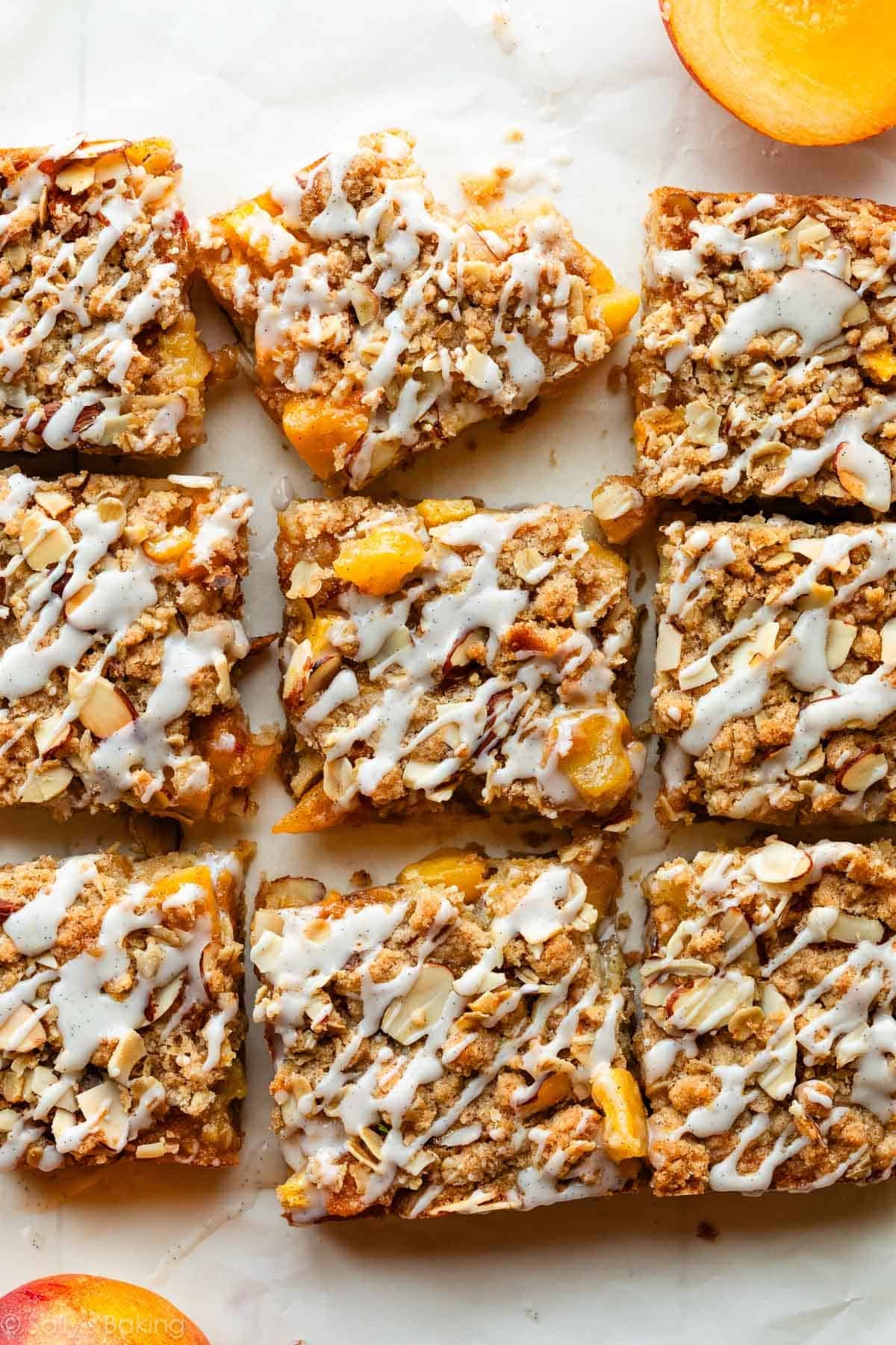 peach pie crumb bars cut into squares.