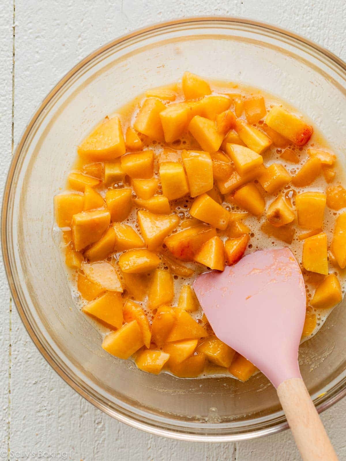 juicy peach filling in glass bowl.