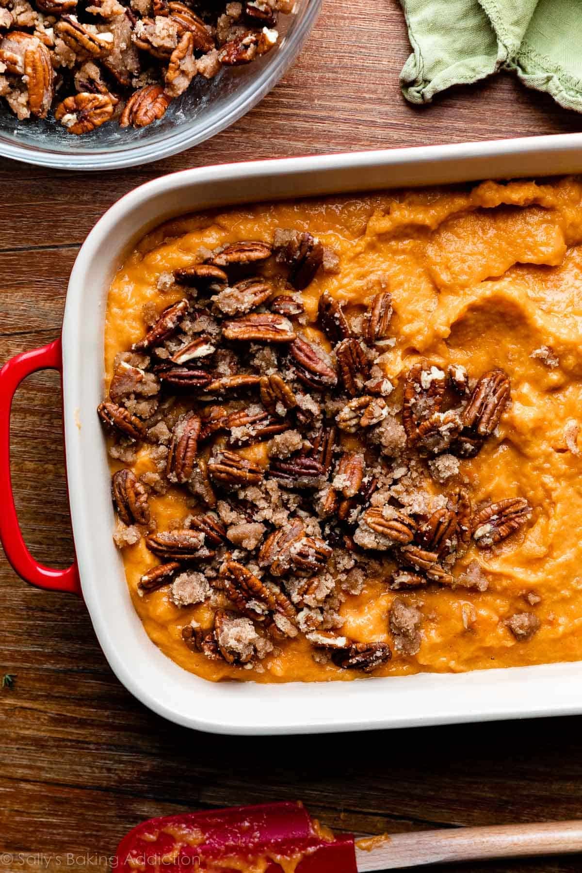 pecan crumble arranged on some of the mashed sweet potato mixer.
