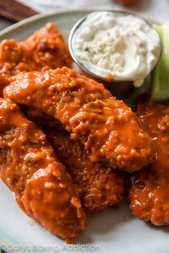 buffalo chicken fingers on a white plate