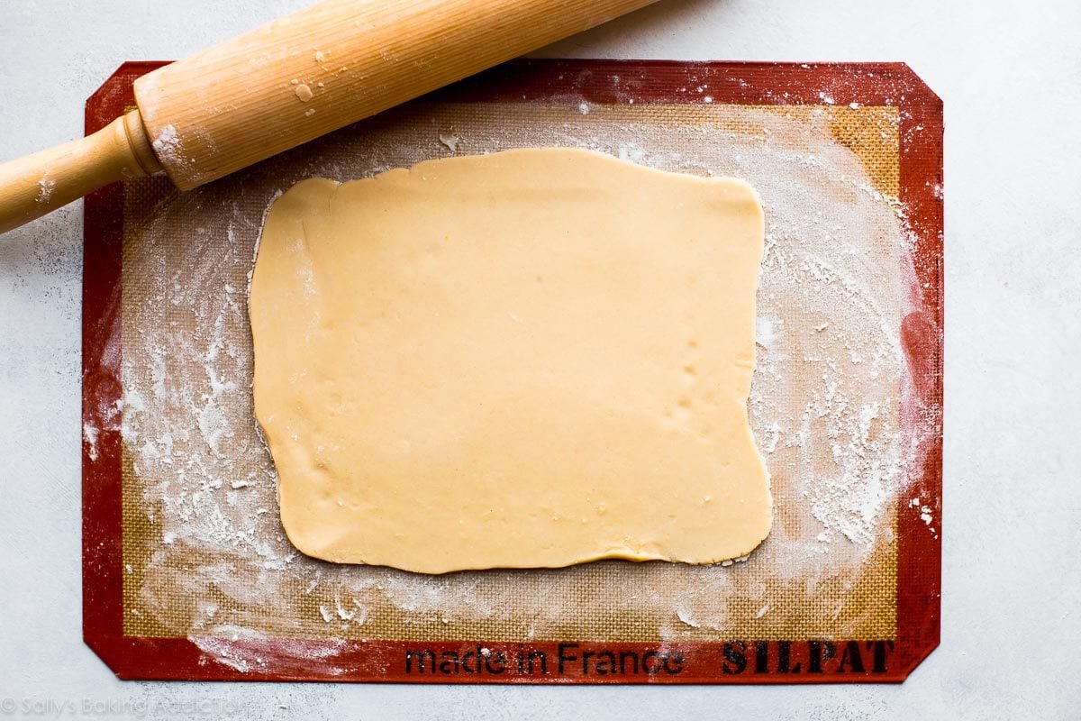 cinnamon roll cookie dough rolled out
