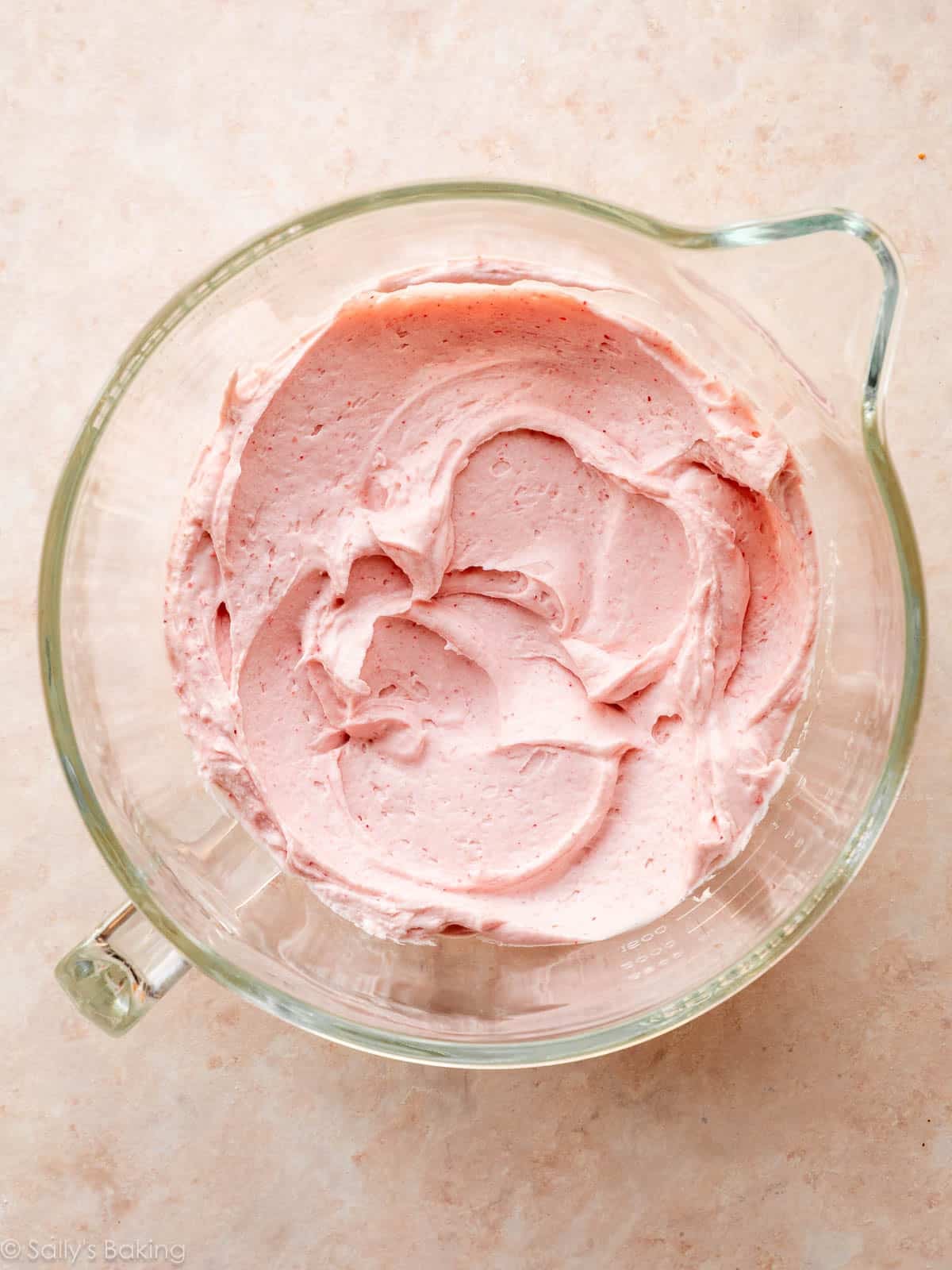 fluffy whipped strawberry mixture in bowl.