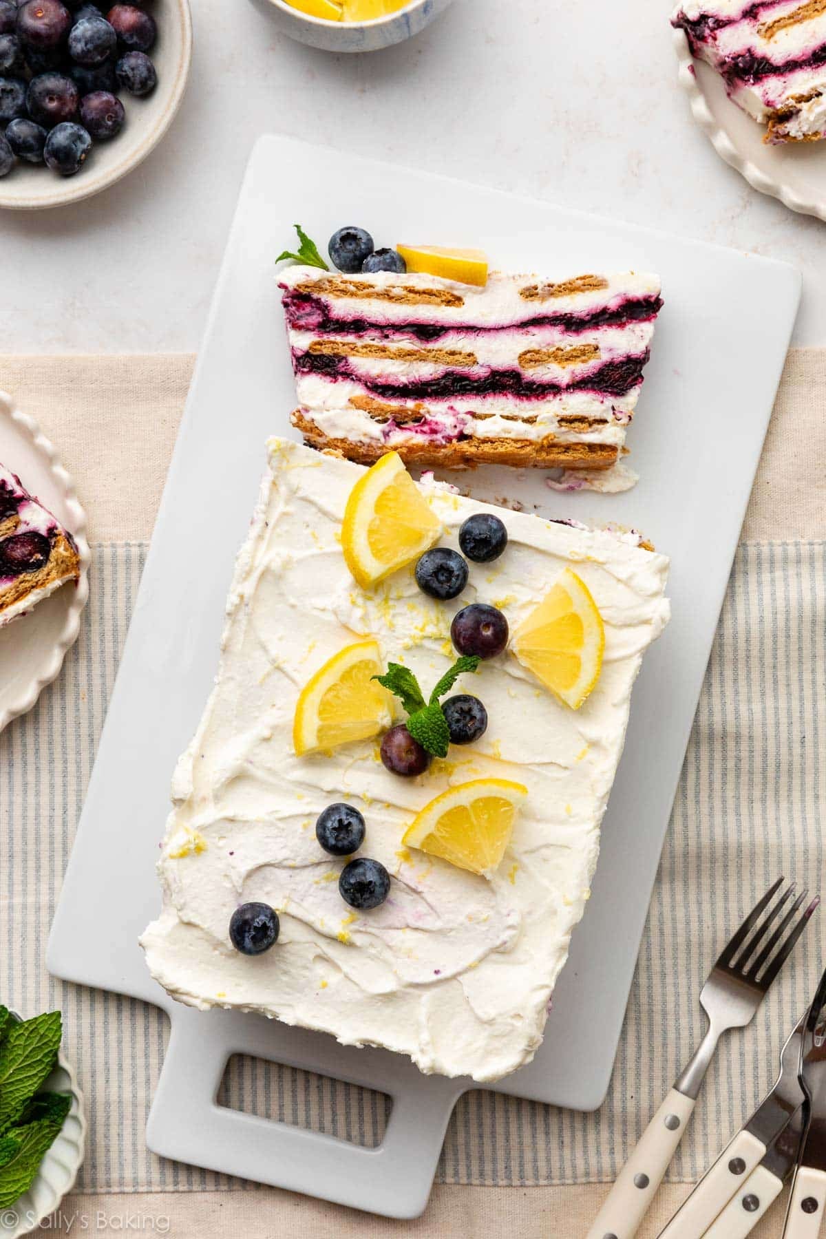 blueberry lemon icebox cake with fresh blueberries on top.