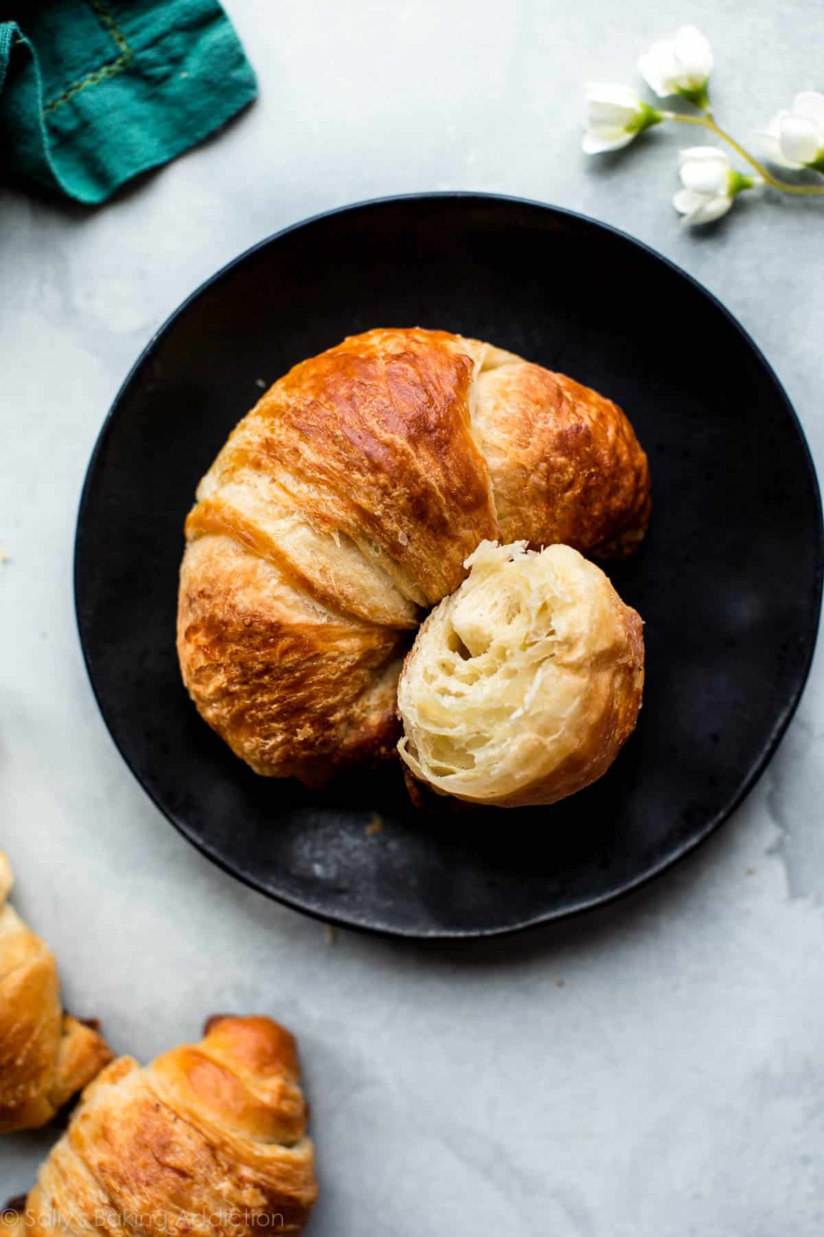 croissant on a black plate
