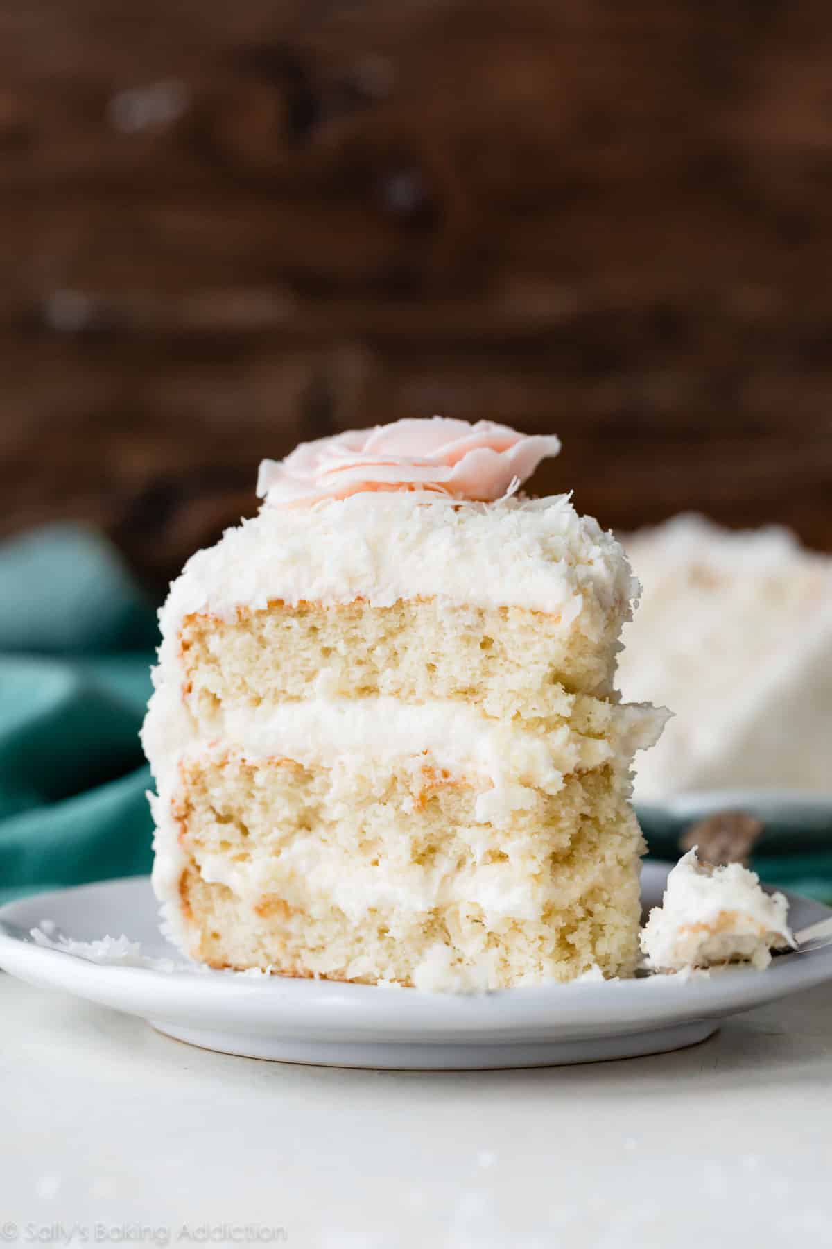 slice of coconut cake on plate