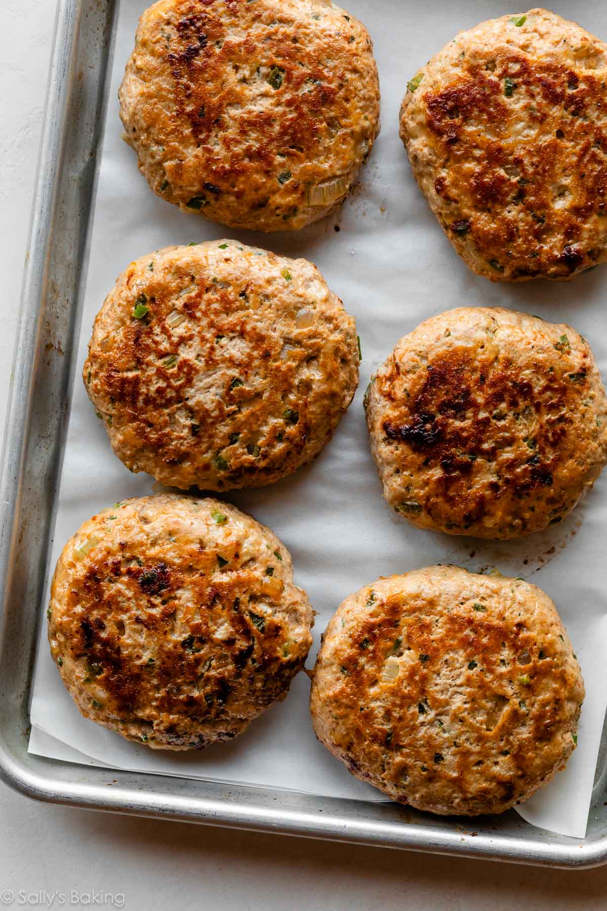 turkey burgers on sheet tray.