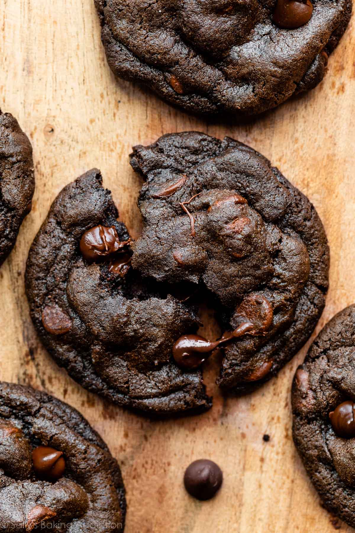 double chocolate chip cookie broken in half.