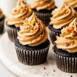 dark chocolate cupcake with peanut butter frosting and Reese's Pieces.