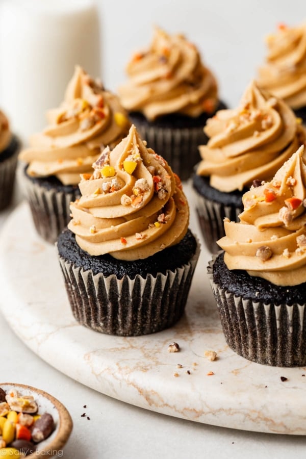 dark chocolate cupcake with peanut butter frosting and Reese's Pieces.