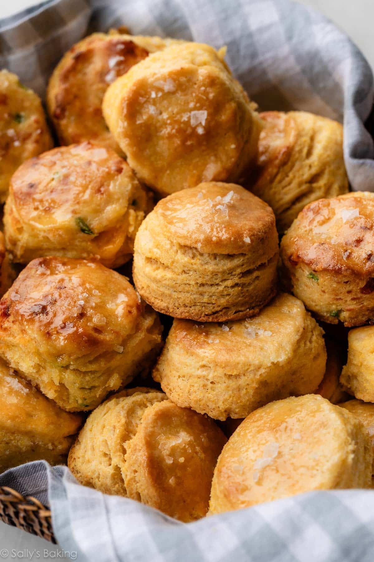 cornbread biscuits in blue gingham linen-lined basket.