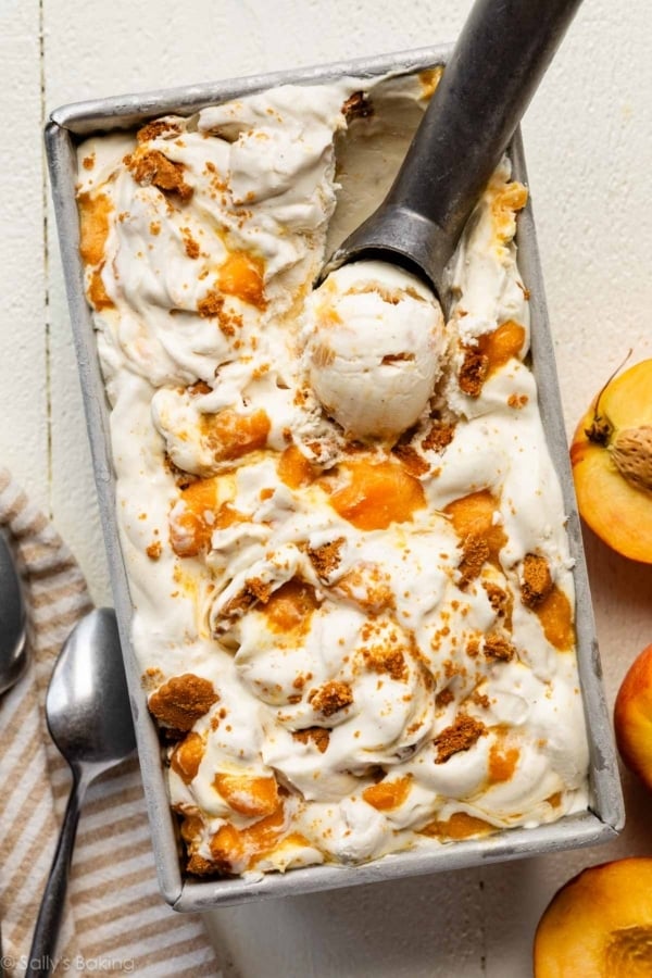 no-churn peach cheesecake ice cream in a loaf pan.